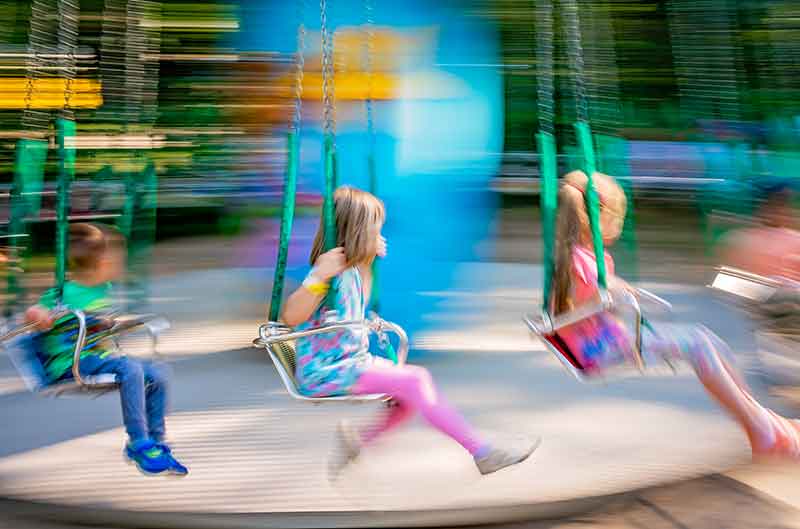 children on a carousel